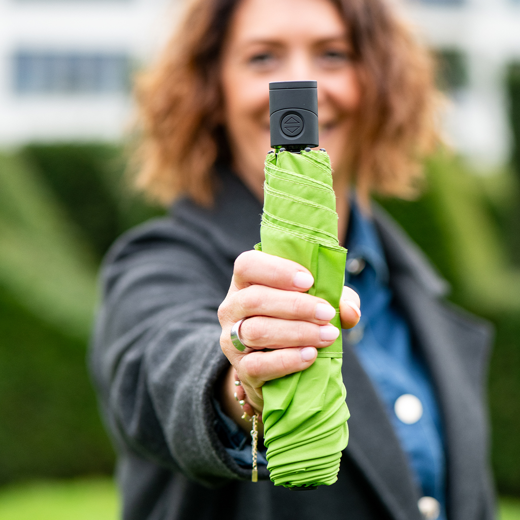 woman with pocket umbrella FiligRain Only200 in her hand